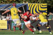 28 September 2024; Tom Farrell of Munster in action against Matteo Canali, left, and Giampietro Ribaldi of Zebre Parma during the United Rugby Championship match between Zebre Parma and Munster at Stadio Sergio Lanfranchi in Parma, Italy. Photo by Roberto Bregani/Sportsfile