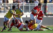 28 September 2024; Tom Farrell of Munster in action against Luca Morisi of Zebre Parma during the United Rugby Championship match between Zebre Parma and Munster at Stadio Sergio Lanfranchi in Parma, Italy. Photo by Roberto Bregani/Sportsfile