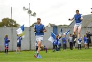 29 September 2024; Breaffy captain Conor O'Shea leads his side out before the Mayo County Senior Club Football Championship quarter-final match between Breaffy and Westport at Breaffy in Mayo. Photo by Tom Beary/Sportsfile