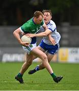 29 September 2024; Paul Cribbin of Johnstownbridge in action against Paddy McDermott of Naas during the Kildare County Senior Club Football Championship quarter-final match between Naas and Johnstownbridge at Manguard Park Hawkfield in Newbridge, Kildare. Photo by Tyler Miller/Sportsfile