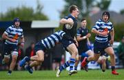 29 September 2024; Joseph Smyth of Corinthians is tackled by Jed O'Malley of Blackrock during the Bank of Ireland JP Fanagan Premier 1 qualifiers final match between Corinthians RFC and Blackrock College RFC at Corinthians RFC in Galway. Photo by Shauna Clinton/Sportsfile