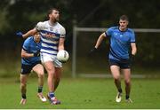 29 September 2024; Aidan O'Shea of Breaffy in action against Conal Dawson, left, and Rory Brickenden of Westport during the Mayo County Senior Club Football Championship quarter-final match between Breaffy and Westport at Breaffy in Mayo. Photo by Tom Beary/Sportsfile