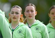 28 September 2024; Republic of Ireland players, including Kate Jones, second from left, sing the national anthem before the women's U17 international friendly match between Republic of Ireland and Cymru at the AUL Complex in Clonsaugh, Dublin. Photo by Shauna Clinton/Sportsfile
