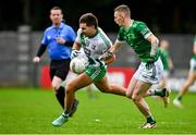 29 September 2024; Karl Hartley of Sarsfields in action against Dylan Cosgrave of Moorefield during the Kildare County Senior Club Football Championship quarter-final match between Moorefield and Sarsfields at Manguard Park Hawkfield in Newbridge, Kildare. Photo by Tyler Miller/Sportsfile