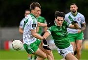 29 September 2024; Evan O'Brien of Moorefield in action against Colm Harnett of Sarsfields during the Kildare County Senior Club Football Championship quarter-final match between Moorefield and Sarsfields at Manguard Park Hawkfield in Newbridge, Kildare. Photo by Tyler Miller/Sportsfile