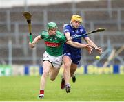 29 September 2024; Conor Stakelum of Thurles Sarsfields in action against Brian McGrath of Loughmore-Castleiney during the Tipperary County Senior Club Hurling Championship semi-final match between Loughmore Castleiney and Thurles Sarsfields at FBD Semple Stadium in Thurles, Tipperary. Photo by Michael P Ryan/Sportsfile