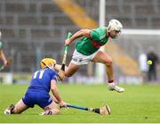 29 September 2024; Ed Connolly of Loughmore-Castleiney in action against Conor Stakelum of Thurles Sarsfields during the Tipperary County Senior Club Hurling Championship semi-final match between Loughmore Castleiney and Thurles Sarsfields at FBD Semple Stadium in Thurles, Tipperary. Photo by Michael P Ryan/Sportsfile