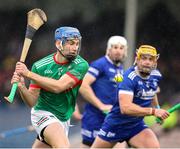 29 September 2024; John McGrath of Loughmore-Castleiney in action against Ronan Maher of Thurles Sarsfields during the Tipperary County Senior Club Hurling Championship semi-final match between Loughmore Castleiney and Thurles Sarsfields at FBD Semple Stadium in Thurles, Tipperary. Photo by Michael P Ryan/Sportsfile