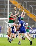 29 September 2024; John Ryan of Loughmore-Castleiney in action against Darragh Stakelum of Thurles Sarsfields during the Tipperary County Senior Club Hurling Championship semi-final match between Loughmore Castleiney and Thurles Sarsfields at FBD Semple Stadium in Thurles, Tipperary. Photo by Michael P Ryan/Sportsfile