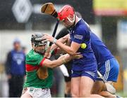 29 September 2024; Tomás McGrath of Loughmore-Castleiney is tackled by James Armstrong of Thurles Sarsfields during the Tipperary County Senior Club Hurling Championship semi-final match between Loughmore Castleiney and Thurles Sarsfields at FBD Semple Stadium in Thurles, Tipperary. Photo by Michael P Ryan/Sportsfile