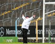 29 September 2024; A umpire signals a wide for Loughmore Castleiney late in the game during the Tipperary County Senior Club Hurling Championship semi-final match between Loughmore Castleiney and Thurles Sarsfields at FBD Semple Stadium in Thurles, Tipperary. Photo by Michael P Ryan/Sportsfile