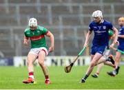 29 September 2024; Ciaran Connolly of Loughmore-Castleiney in action against Cian Stakelum of Thurles Sarsfields during the Tipperary County Senior Club Hurling Championship semi-final match between Loughmore Castleiney and Thurles Sarsfields at FBD Semple Stadium in Thurles, Tipperary. Photo by Michael P Ryan/Sportsfile