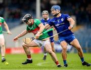 29 September 2024; Tomás McGrath of Loughmore-Castleiney in action against Paul Maher of Thurles Sarsfields during the Tipperary County Senior Club Hurling Championship semi-final match between Loughmore Castleiney and Thurles Sarsfields at FBD Semple Stadium in Thurles, Tipperary. Photo by Michael P Ryan/Sportsfile