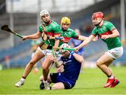 29 September 2024; Denis Maher of Thurles Sarsfields in action against Loughmore Castleiney players from left, Ed Connolly, Liam McGrath, and Eoin O'Connell during the Tipperary County Senior Club Hurling Championship semi-final match between Loughmore Castleiney and Thurles Sarsfields at FBD Semple Stadium in Thurles, Tipperary. Photo by Michael P Ryan/Sportsfile