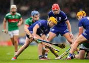 29 September 2024; Conor Stakelum of Thurles Sarsfields in action against John McGrath of Loughmore-Castleiney during the Tipperary County Senior Club Hurling Championship semi-final match between Loughmore Castleiney and Thurles Sarsfields at FBD Semple Stadium in Thurles, Tipperary. Photo by Michael P Ryan/Sportsfile