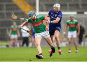 29 September 2024; Joey Hennessy of Loughmore-Castleiney in action against Denis Maher of Thurles Sarsfields during the Tipperary County Senior Club Hurling Championship semi-final match between Loughmore Castleiney and Thurles Sarsfields at FBD Semple Stadium in Thurles, Tipperary. Photo by Michael P Ryan/Sportsfile