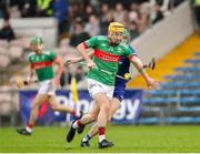 29 September 2024; Paul McCahey of Loughmore-Castleiney in action against Mossie McCormack of Thurles Sarsfields during the Tipperary County Senior Club Hurling Championship semi-final match between Loughmore Castleiney and Thurles Sarsfields at FBD Semple Stadium in Thurles, Tipperary. Photo by Michael P Ryan/Sportsfile