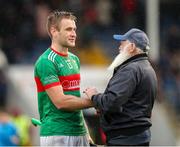 29 September 2024; John McGrath of Loughmore-Castleiney is congratulated by a supporter after the Tipperary County Senior Club Hurling Championship semi-final match between Loughmore Castleiney and Thurles Sarsfields at FBD Semple Stadium in Thurles, Tipperary. Photo by Michael P Ryan/Sportsfile