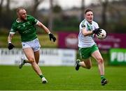 29 September 2024; Ethan Mountaine of Sarsfields in action against Ryan Moore of Moorefield during the Kildare County Senior Club Football Championship quarter-final match between Moorefield and Sarsfields at Manguard Park Hawkfield in Newbridge, Kildare. Photo by Tyler Miller/Sportsfile