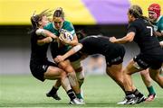 29 September 2024; Eimear Considine of Ireland is tackled by Renee Holmes and Sylvia Brunt of New Zealand during the WXV1 Pool match between New Zealand and Ireland at BC Place in Vancouver, British Columbia. Photo by Rich Lam / World Rugby via Sportsfile