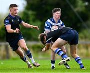 29 September 2024; Harry Casey of Blackrock is tackled by Joseph Smyth of Corinthians during the Bank of Ireland JP Fanagan Premier 1 qualifiers final match between Corinthians RFC and Blackrock College RFC at Corinthians RFC in Galway. Photo by Shauna Clinton/Sportsfile