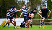 29 September 2024; Joshua Tunney-Ware of Corinthians is tackled by Lochlainn Maher of Blackrock during the Bank of Ireland JP Fanagan Premier 1 qualifiers final match between Corinthians RFC and Blackrock College RFC at Corinthians RFC in Galway. Photo by Shauna Clinton/Sportsfile