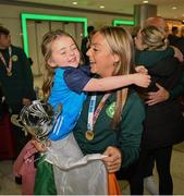 18 September 2024; Niamh Ryan with her daughter Ailbhe, age 3, on arrival at Dublin Airport during the Men's and Women's Republic of Ireland Homeless teams' return from the 2024 Homeless World Cup in South Korea, where the Women's Team won the Trophy Stage and the Men's Team finished 8th. Photo by David Fitzgerald/Sportsfile
