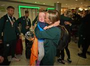 18 September 2024; Niamh Ryan with her daughter Ailbhe, age 3, on arrival at Dublin Airport during the Men's and Women's Republic of Ireland Homeless teams' return from the 2024 Homeless World Cup in South Korea, where the Women's Team won the Trophy Stage and the Men's Team finished 8th. Photo by David Fitzgerald/Sportsfile