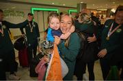 18 September 2024; Niamh Ryan with her daughter Ailbhe, age 3, on arrival at Dublin Airport during the Men's and Women's Republic of Ireland Homeless teams' return from the 2024 Homeless World Cup in South Korea, where the Women's Team won the Trophy Stage and the Men's Team finished 8th. Photo by David Fitzgerald/Sportsfile