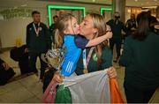 18 September 2024; Niamh Ryan with her daughter Ailbhe, age 3, on arrival at Dublin Airport during the Men's and Women's Republic of Ireland Homeless teams' return from the 2024 Homeless World Cup in South Korea, where the Women's Team won the Trophy Stage and the Men's Team finished 8th. Photo by David Fitzgerald/Sportsfile