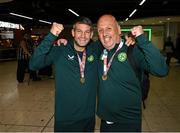 18 September 2024; Will Rafter and CEO of the Irish Homeless Street League Chris O'Brien on arrival at Dublin Airport during the Men's and Women's Republic of Ireland Homeless teams' return from the 2024 Homeless World Cup in South Korea, where the Women's Team won the Trophy Stage and the Men's Team finished 8th. Photo by David Fitzgerald/Sportsfile