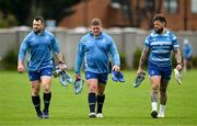 30 September 2024; Leinster players, from left, Cian Healy, Tadhg Furlong and Andrew Porter arrive for during squad training at UCD in Dublin. Photo by Brendan Moran/Sportsfile
