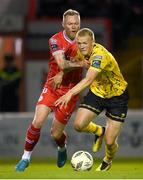 30 September 2024; Tom Grivosti of St Patrick's Athletic in action against Aiden O'Brien of Shelbourne during the SSE Airtricity Men's Premier Division match between Shelbourne and St Patrick's Athletic at Tolka Park in Dublin. Photo by Stephen McCarthy/Sportsfile