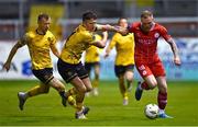 30 September 2024; Aiden O'Brien of Shelbourne in action against Joe Redmond of St Patrick's Athletic during the SSE Airtricity Men's Premier Division match between Shelbourne and St Patrick's Athletic at Tolka Park in Dublin. Photo by Tyler Miller/Sportsfile