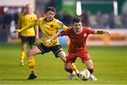 30 September 2024; Ali Coote of Shelbourne in action against Kian Leavy of St Patrick's Athletic during the SSE Airtricity Men's Premier Division match between Shelbourne and St Patrick's Athletic at Tolka Park in Dublin. Photo by Stephen McCarthy/Sportsfile