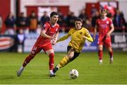 30 September 2024; Ali Coote of Shelbourne in action against Kian Leavy of St Patrick's Athletic during the SSE Airtricity Men's Premier Division match between Shelbourne and St Patrick's Athletic at Tolka Park in Dublin. Photo by Stephen McCarthy/Sportsfile