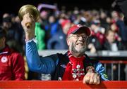 30 September 2024; St Patrick's Athletic supporter Brian Manning celebrates his side's victory after the SSE Airtricity Men's Premier Division match between Shelbourne and St Patrick's Athletic at Tolka Park in Dublin. Photo by Stephen McCarthy/Sportsfile