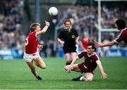 21 September 1986; Ivan Aherne of Cork in action against Alan Mulholland of Galway during the GAA All-Ireland Minor Football Championship final between Cork and Galway at Croke Park in Dublin. Photo by Ray McManus/Sportsfile