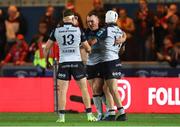 4 October 2024; Peter Dooley of Connacht, centre, celebrates with team-mates Cathal Forde and Mack Hansen after the United Rugby Championship match between Scarlets and Connacht at Parc Y Scarlets in Llanelli, Wales. Photo by Gareth Everett/Sportsfile