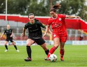 5 October 2024; Noelle Murray of Shelbourne in action against Niamh Farrelly of Peamount United during the SSE Airtricity Women's Premier Division match between Shelbourne and Peamount United at Tolka Park in Dublin. Photo by Thomas Flinkow/Sportsfile