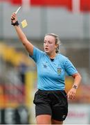 5 October 2024; Referee Kate O'Brien shows a yellow card to Niamh Farrelly of Peamount United during the SSE Airtricity Women's Premier Division match between Shelbourne and Peamount United at Tolka Park in Dublin. Photo by Thomas Flinkow/Sportsfile