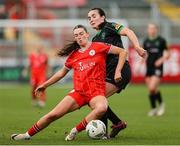 5 October 2024; Hannah Healy of Shelbourne in action against Niamh Farrelly of Peamount United during the SSE Airtricity Women's Premier Division match between Shelbourne and Peamount United at Tolka Park in Dublin. Photo by Thomas Flinkow/Sportsfile