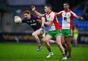 5 October 2024; Michael Conroy of Cuala in action against Dean Rock, centre, and James McCarthy of Ballymun Kickhams during the Dublin County Senior Club Football Championship semi-final match between Ballymun Kickhams and Cuala at Parnell Park in Dublin. Photo by Ben McShane/Sportsfile