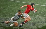 5 October 2024; Mike Haley of Munster is tackled by Phil Cokanasiga of Ospreys during the United Rugby Championship match between Munster and Ospreys at Virgin Media Park in Cork. Photo by Tyler Miller/Sportsfile