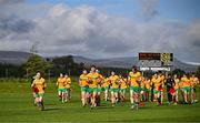 6 October 2024; The Ballinamore Sean O'Heslins team make their way over for the team photograph before the Leitrim County Senior Club Football Championship final match between Ballinamore Sean O'Heslins and Mohill at Ballinamore Sean O'Heslins GAA Club in Leitrim. Photo by Sam Barnes/Sportsfile