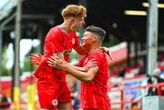 6 October 2024; Dan Ring of Shelbourne celebrates with team-mate Aaron Keogh after scoring their side's first goal during the EA SPORTS MU17 LOI Mark Farren Cup match between Shelbourne and Kerry FC at Tolka Park in Dublin. Photo by Tyler Miller/Sportsfile