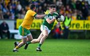 6 October 2024; Domhnaill Flynn of Mohill in action against Wayne McKeon of Ballinamore Sean O'Heslins during the Leitrim County Senior Club Football Championship final match between Ballinamore Sean O'Heslins and Mohill at Ballinamore Sean O'Heslins GAA Club in Leitrim. Photo by Sam Barnes/Sportsfile