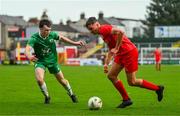 6 October 2024; Dan Ring of Shelbourne in action against Cian Beirne of Kerry FC during the EA SPORTS MU17 LOI Mark Farren Cup match between Shelbourne and Kerry FC at Tolka Park in Dublin. Photo by Tyler Miller/Sportsfile