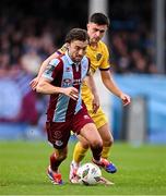 6 October 2024; Darragh Markey of Drogheda United in action against Darragh Levingston of Wexford during the Sports Direct Men’s FAI Cup semi-final match between Drogheda United and Wexford at Weavers Park in Drogheda, Louth. Photo by Ben McShane/Sportsfile
