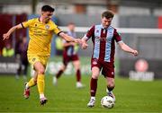 6 October 2024; Conor Kane of Drogheda United in action against Darragh Levingston of Wexford during the Sports Direct Men’s FAI Cup semi-final match between Drogheda United and Wexford at Weavers Park in Drogheda, Louth. Photo by Ben McShane/Sportsfile